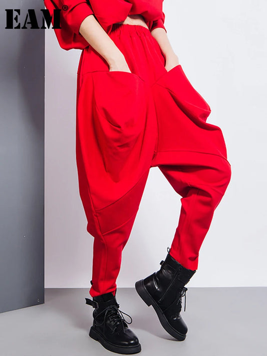 [EAM] Big Pockets Spliced Irregular High Waist Harem Trousers New Loose Fit Pants Women Fashion Tide Spring Autumn 2025 1DD2684